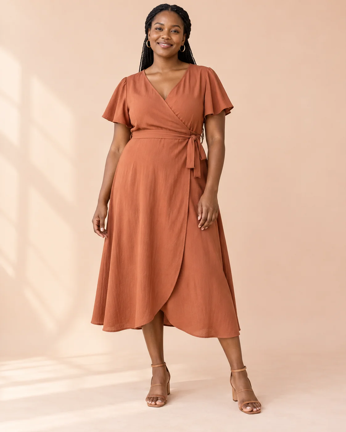 Demonstration image: The Everyday Wrap Dress in terracotta